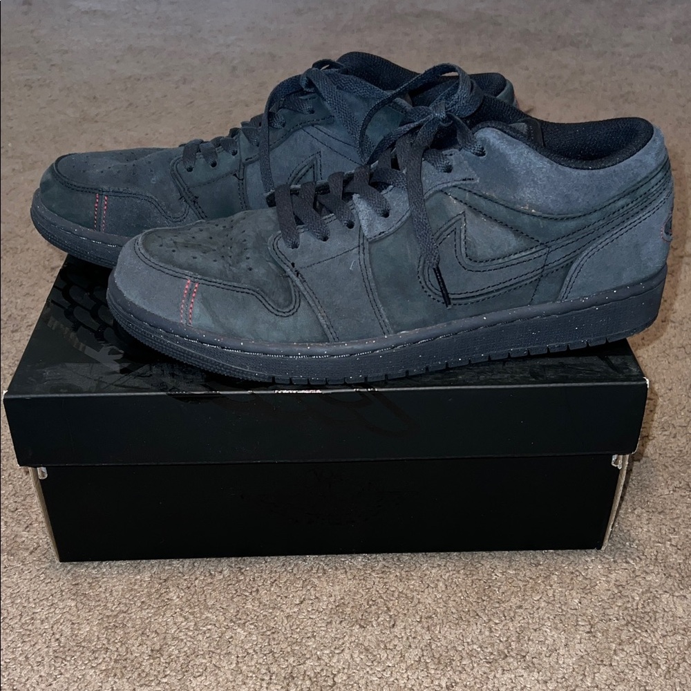 Nike Air Jordan 1 Low Sneakers in Smoke Grey with Red Stitch Accents
